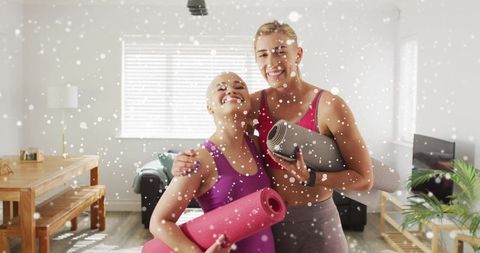 Smiling Workout Partners Holding Yoga Mats in Cozy Living Room
