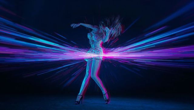 Futuristic Neon Dancer with Dynamic Motion Streaks