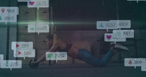 Athletic Woman Exercising with Ab Roller on Gym Mat with Digital Overlay