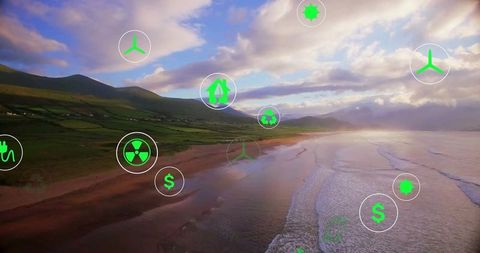 Sustainable Energy Icons Over Scenic Coastal Beach at Dusk