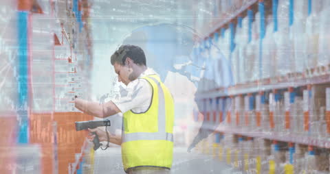 Warehouse Worker Using Scanning Device with Digital Data Overlay