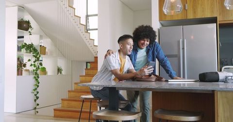 Caring Father and Son Bond Using Smartphone in Modern Home