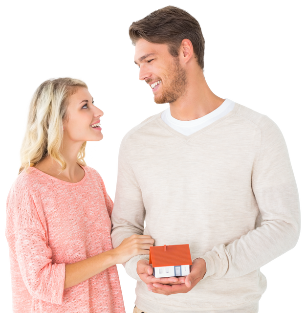 Happy Couple Holding Transparent Miniature House Model - Download Free Stock Videos Pikwizard.com