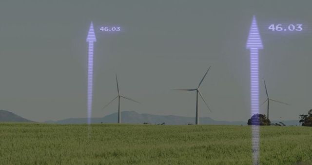 Wind turbines in green field with data visual graphics