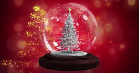 Festive Snow Globe Embracing Christmas Spirit with Glowing Tree