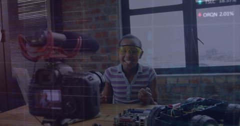 Young Student Recording Tech Project Vlog on Camera at Home