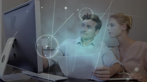 Couple Calculating Finances with Digital Network Overlay