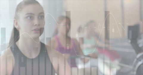 Woman exercising on rowing machine with digital data overlay
