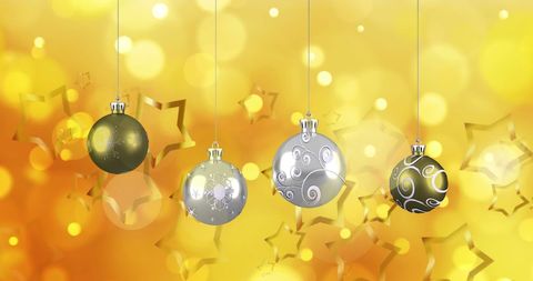 Festive Hanging Ornaments with Golden Star Bokeh Background