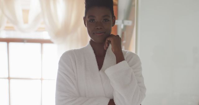 Confident Woman in Bathrobe Standing in Bright Room - Download Free Stock Images Pikwizard.com