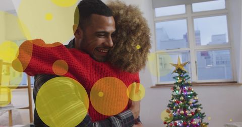 Joyful Embrace During Festive Christmas Celebration - Download Free Stock Images Pikwizard.com