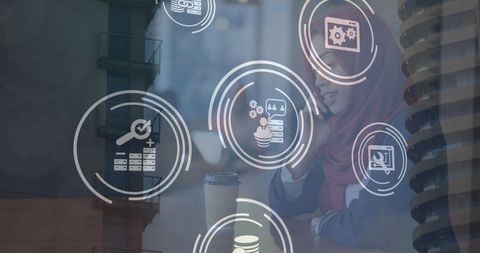 Businesswoman Engaging with Digital Icons and Technology