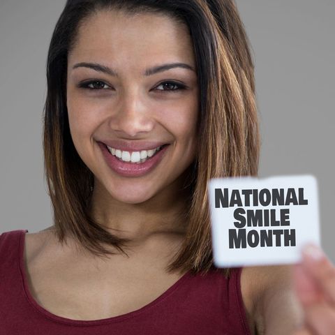 smiling young woman promoting national smile month - Download Free Stock Templates Pikwizard.com
