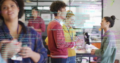 Diverse Coworkers Collaborating on Code in Modern Tech Workspace