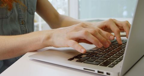 Young Woman Typing on Laptop Focused on Work and Communication - Download Free Stock Images Pikwizard.com
