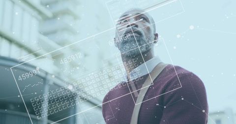 Businessman Engaging with Digital Financial Interfaces