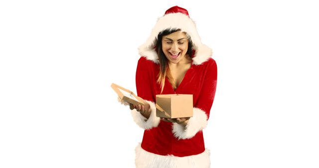 Excited Woman in Santa Hat Opening Christmas Gift - Download Free Stock Images Pikwizard.com