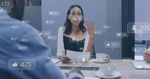 Female executive presenting strategy in meeting with social media engagement overlays