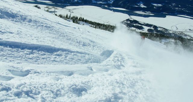 Skier making powerful turn on snowy mountain slope - Download Free Stock Images Pikwizard.com