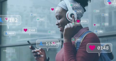 African American Woman Engaging with Social Media While Listening to Music - Download Free Stock Images Pikwizard.com