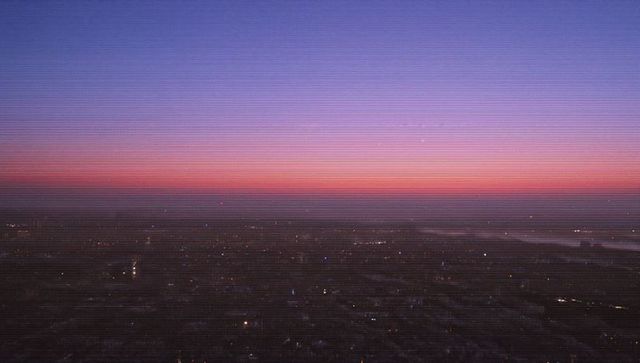 Stunning cityscape over horizon at dusk