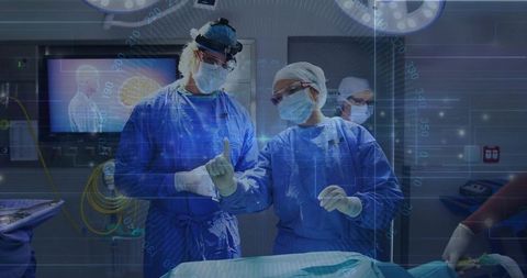 Surgeons consulting in operating room with medical technology