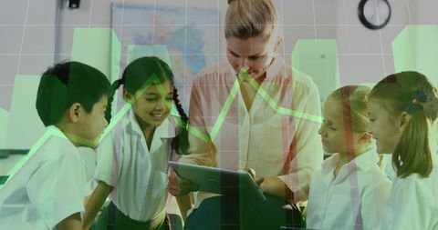 Teacher guiding students with tablet in modern classroom
