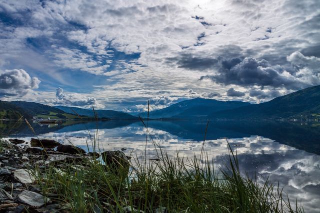 Serene Mountain Lake Reflecting Dramatic Cloudscape - Download Free Stock Photos Pikwizard.com