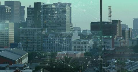 City skyline showing digital network overlay connecting rooftops and high-rise buildings