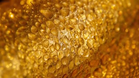 Golden Droplets Transform in Against Luminous Background