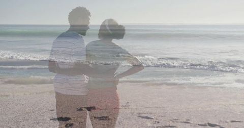Couple Embracing on Tranquil Beachfront with Ocean Waves