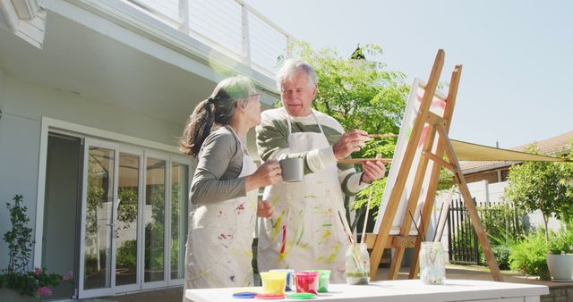 Senior couple engaging in outdoor painting activity - Download Free Stock Images Pikwizard.com