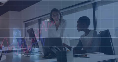 Diverse Businesswomen Analyzing Financial Data Trends