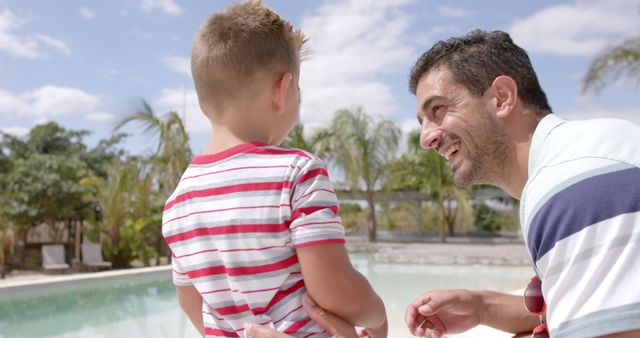 Father and Son Enjoying Day by Pool,Bonding Together, Outdoors, Warm Weather - Download Free Stock Images Pikwizard.com