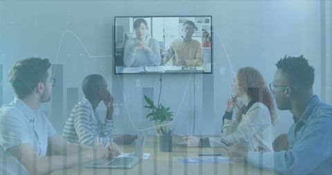 Diverse Team Engaged in Virtual Business Meeting Analyzing Financial Data