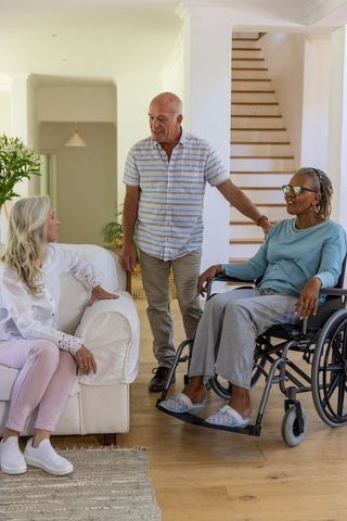 Diverse Senior Family Communicating in Modern Living Room