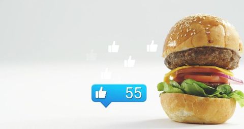 Sesame seed cheeseburger with blue like bubble 55 social engagement food marketing