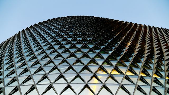 Futuristic Architectural Glass Structure Against Blue Sky - Download Free Stock Photos Pikwizard.com