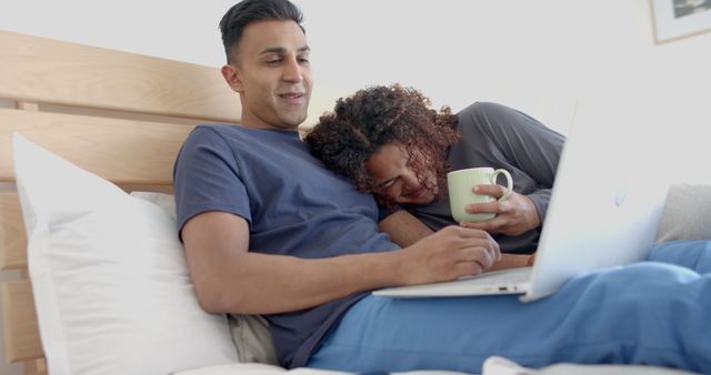 Happy Couple Relaxing In Bed Watching Laptop Together - Download Free Stock Images Pikwizard.com