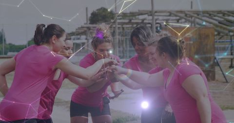 Diverse Women Building Team Spirit on Obstacle Course
