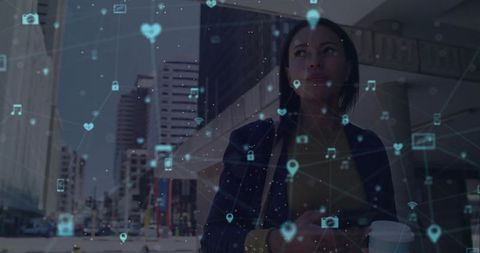 Businesswoman Utilizing Digital Connectivity in Urban Environment