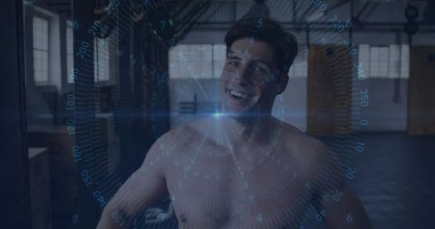 Smiling Shirtless Athlete Posing in Industrial Gym with Futuristic Blue HUD Overlay Conveying Confid
