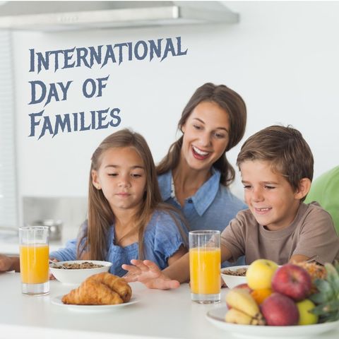 Happy family enjoying breakfast for international day of families