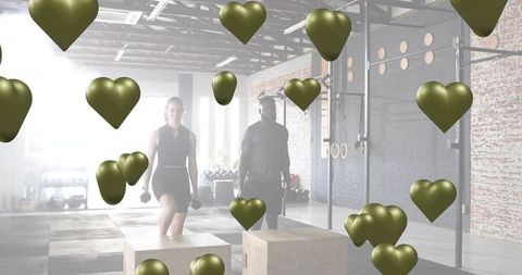 Performing step-up dumbbell workout on plyo boxes with floating olive hearts, fitness duo
