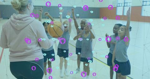 Coach holding basketball coaching youth teamwork drills indoor gym kids training ai overlay