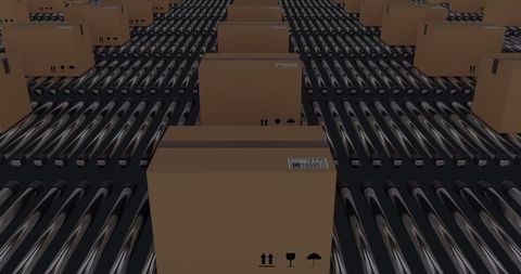 Packages moving on conveyor belt in an automated warehouse
