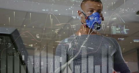 High-performance runner testing metabolic output with mask and real-time biometric overlay
