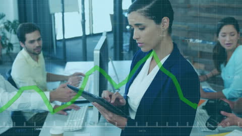 Business Woman Analyzing Financial Data on Tablet in Office