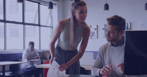 Collaboration in Modern Open-Plan Office with Professionals