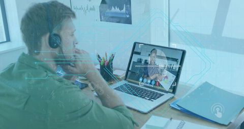 Man Engaging in Biometric Fingerprint Authentication on Laptop